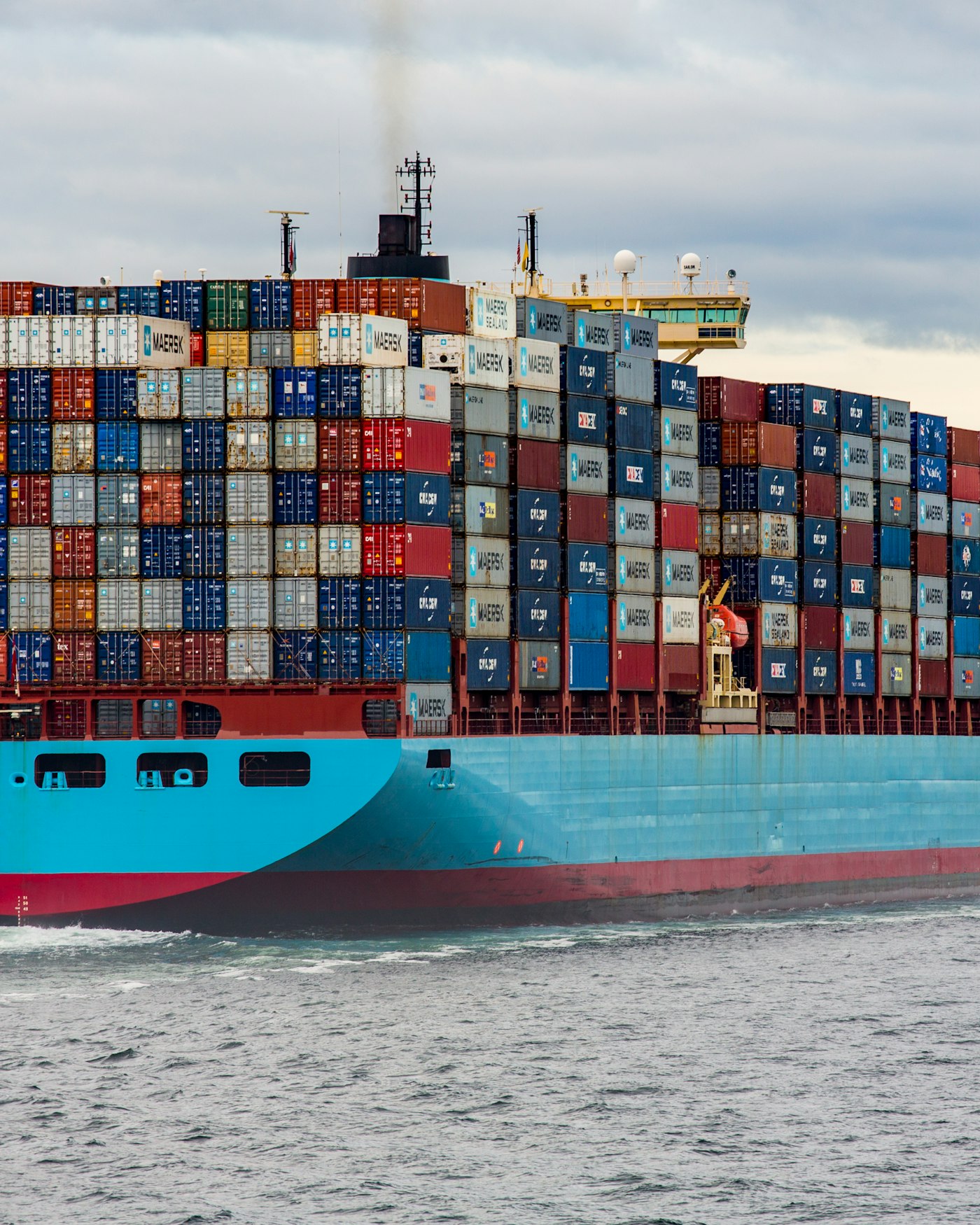 Container ship loaded with cargo at sea